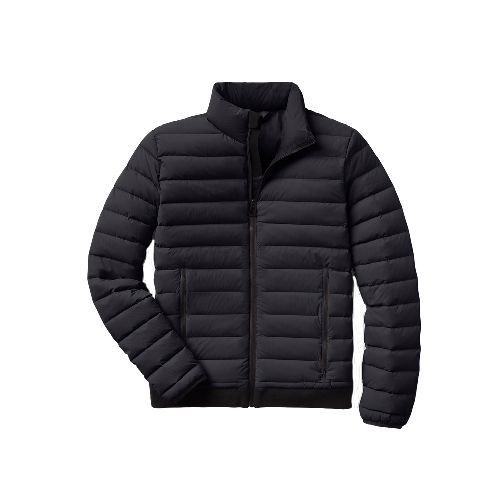 The Aether Launch Full Zip Jacket NH is a black puffer jacket designed with a high collar and front zipper. It features horizontal quilting and two side pockets, offering warmth with down insulation while being water-resistant—perfect for chilly, wet weather.