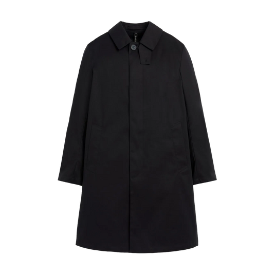 The M Manchester overcoat by Mackintosh, a black single-breasted design made from breathable fabric, is displayed against a plain white background.