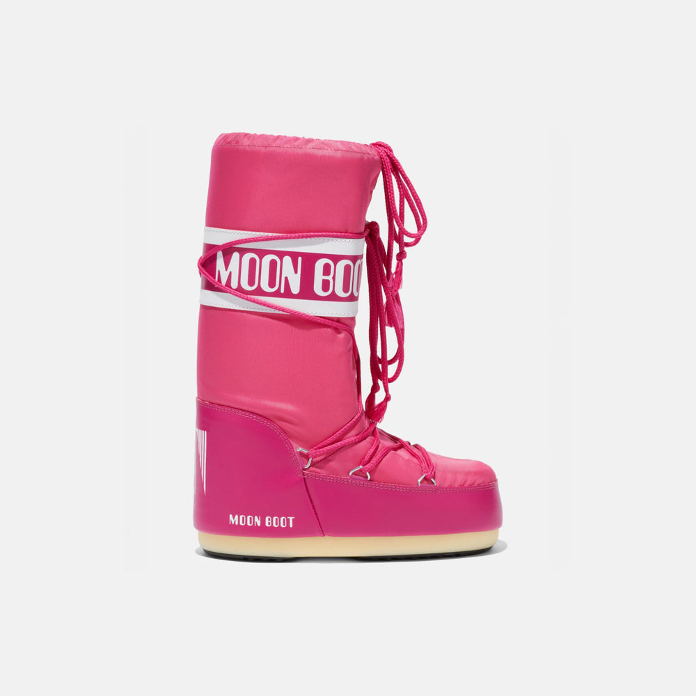 The Icon Nylon Pink Moon Boot features water-repellent material, laces, bold white branding, and a stylish beige sole. Perfect for braving the elements in style, this insulated boot offers both fashion and function on a plain white backdrop.