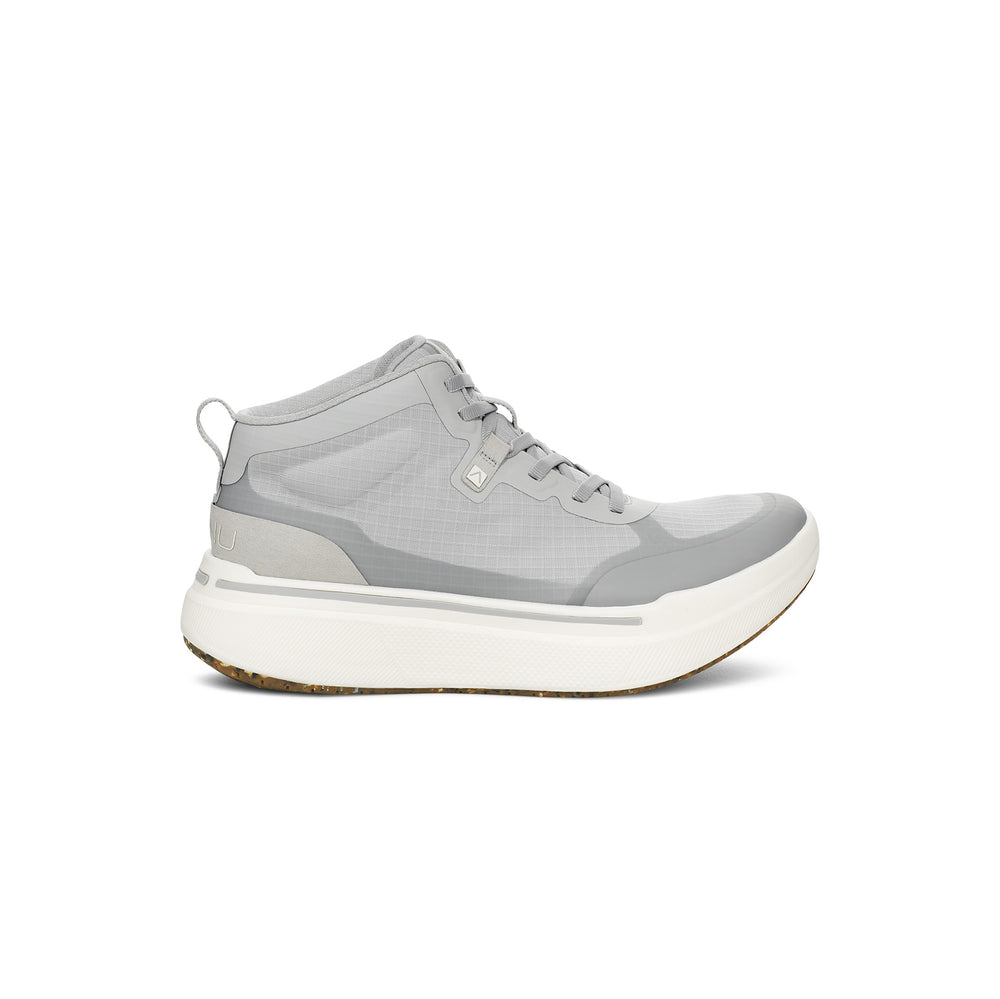 The AHNU M Sequence Mid, Grey is a high-top sneaker with a white sole, flat laces, and a heel pull tab. It features sleek rocker geometry for enhanced stride and offers an elegant side profile.