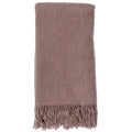 The Classic Throw by Alashan is a folded, soft brown blanket made of ultrafine merino wool, featuring fringe at one end.