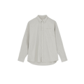 The Classic Chetna Cotton Shirt by Aiayu, a light gray button-up made from organic cotton and featuring a front pocket, is displayed against a solid black background.