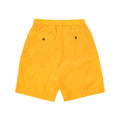 The Pleated Track Shorts by Universal Works, in orange, feature an elasticated waist with pleats and two back pockets with button closures, showcased against a white background.