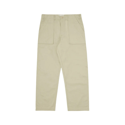 Universal Works Fatigue Pant Twill in Stone offers a straight-leg design with front button and zipper, complete with two large front pockets and belt loops.