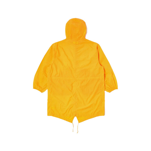 BEACH PARKA in orange from Universal Works showcased against a plain white background.