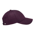 A dark purple Wool Tech Cap by Varsity Headwear, featuring a curved brim, shown from the side.