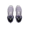 A pair of Women's Cloudrock 2 Waterproof shoes in purple from On Running, featuring a CloudTec® outsole and white laces, is viewed from above on a black background, highlighting their innovative design.