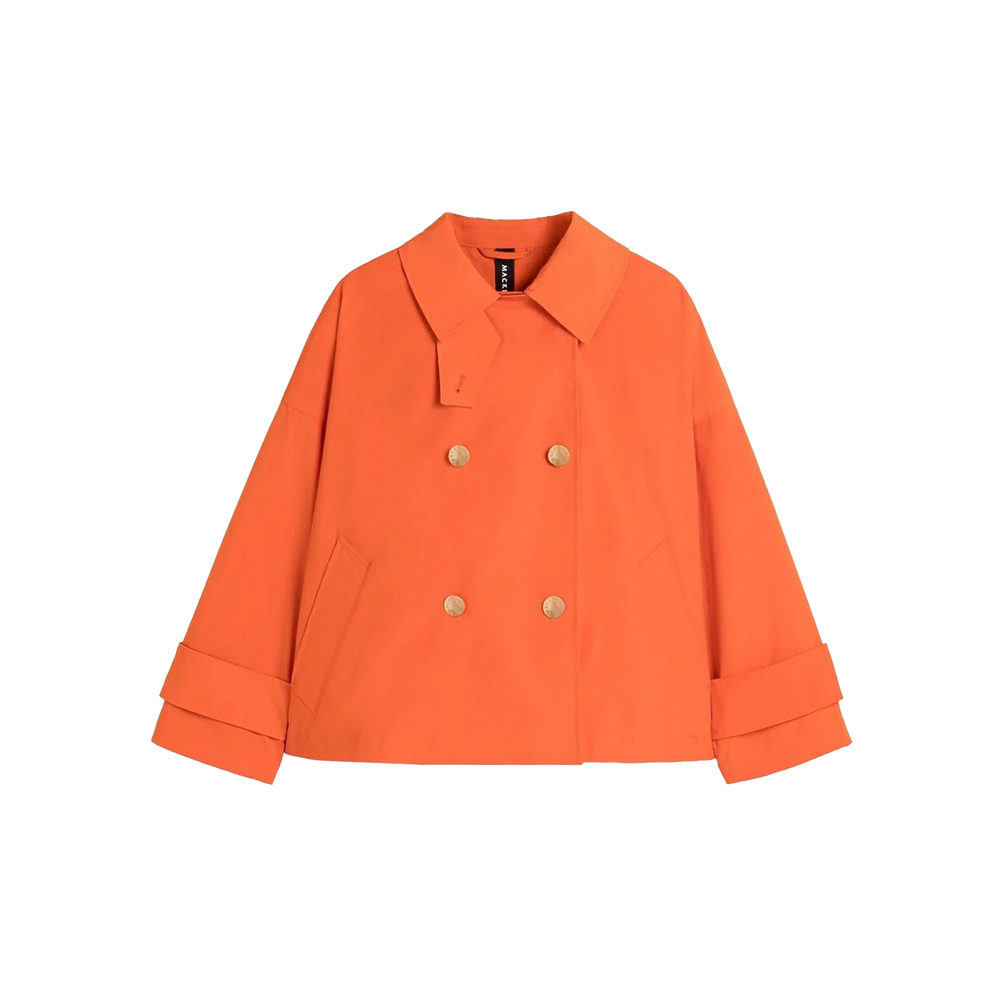 The W Humbie DB Short Nylon by Mackintosh is an orange double-breasted coat featuring wide cuffs, a notched collar, and two front pockets; it also offers water-repellent protection for added durability.