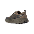 The Hoka Stealth/Tech Bondi 8 Caged is a brown and black athletic shoe with a thick sole, featuring the brand logo on the side.