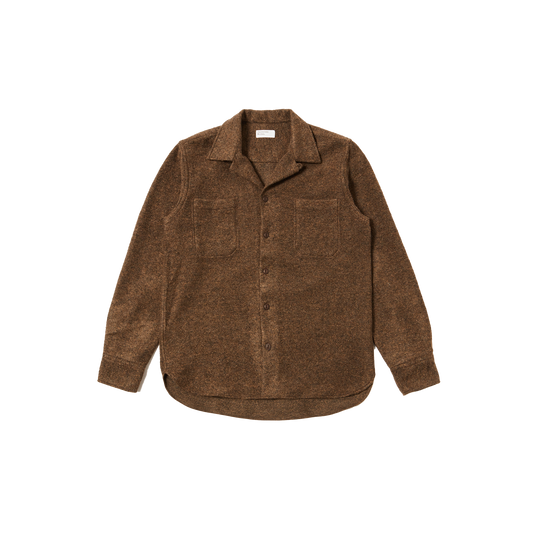 Universal Works' Work Shirt in wool features a brown button-up design with a one-piece collar, long sleeves, and two pockets, laid flat against a white background.