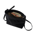 The Zipper Pouch Mini by Bags in Progress is a stylish black mini shoulder bag made from water-repellent recycled polyester, featuring an open zipper that reveals space for a wallet and other small essentials inside.